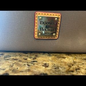 Dooney & Bourke purse. Like new , red inside with plenty of room .